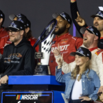 NASCAR Xfinity Series team owner Dale Earnhardt Jr and sister Kelley Earnhardt Miller celebrate with driver Justin Allgaier after winning the 2024 Xfinity Series championship during the Championship race at Phoenix Raceway.