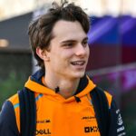 Formula One Qatar Grand Prix - Sprint and Race Qualifying Australian driver Oscar Piastri of McLaren walks arrives at the paddock ahead of the Sprint race at the Lusail International Circuit