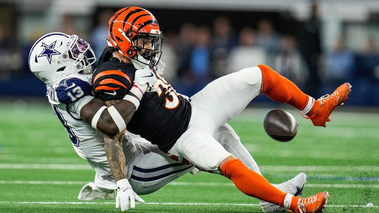 Dallas Cowboys linebacker DeMarvion Overshown takes down Cincinnati Bengals running back Chase Brown (30) Monday Night Football at AT&T Stadium in Arlington,Texas on Monday, December 9, 2024.