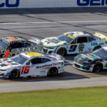 Oct 6, 2024; Talladega, Alabama, USA; Shane Van Gisbergen (16) and Ross Chastain (1) battle for the lead with Chase Elliott (9) and Brad Keselowski (6) trailing during the second stage of the YellaWood 500 at Talladega Superspeedway. Mandatory Credit: Vasha Hunt-Imagn Images