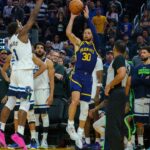 Golden State Warriors guard Stephen Curry (30) attempts to tie the game with a three point shot with two seconds left in the game against Minnesota Timberwolves guard Anthony Edwards (1) during the fourth quarter at Chase Center