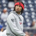Houston Texans quarterback C.J. Stroud (7) walks on the field before the game against the Miami Dolphins at NRG Stadium.