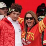 Kansas City Chiefs quarterback Patrick Mahomes (15) celebrates with his mother Randi Martin during the Kansas City Chiefs Super Bowl parade.