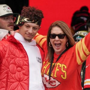 Kansas City Chiefs quarterback Patrick Mahomes (15) celebrates with his mother Randi Martin during the Kansas City Chiefs Super Bowl parade.