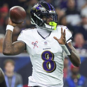 Dec 15, 2024; Houston, Texas, USA; Baltimore Ravens quarterback Lamar Jackson (8) throws the ball during the second quarter against the Houston Texans at NRG Stadium.