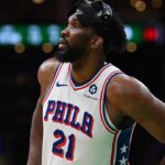 Philadelphia 76ers center Joel Embiid (21) waits during a timeout during the second half against the Boston Celtics at TD Garden.