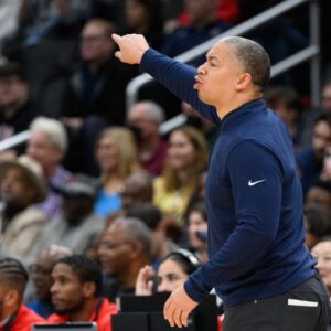LA Clippers head coach Tyronn Lue calls a play during the second quarter against the Washington Wizards at Capital One Arena.