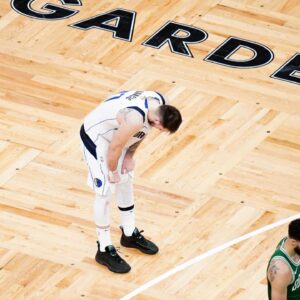 Dallas Mavericks guard Luka Doncic (77) reacts in the fourth quarter against the Boston Celtics during game five of the 2024 NBA Finals at TD Garden.