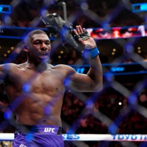 Joaquin Buckley (blue gloves) reacts after defeating Stephen Thompson (red gloves) during UFC 307 at Delta Center.