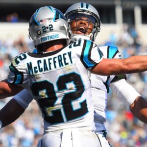 Oct 7, 2018; Charlotte, NC, USA; Carolina Panthers running back Christian McCaffrey (22) celebrates with quarterback Cam Newton (1) after scoring a touchdown in the fourth quarter at Bank of America Stadium.