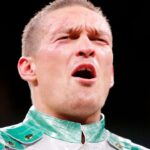 Oleksandr Usyk (white trunks) after his win over Chazz Witherspoon (not pictured) box during a heavyweight boxing match at Wintrust Arena.