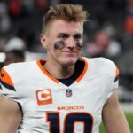 Denver Broncos quarterback Bo Nix (10) reacts after the game against the Las Vegas Raiders at Allegiant Stadium.