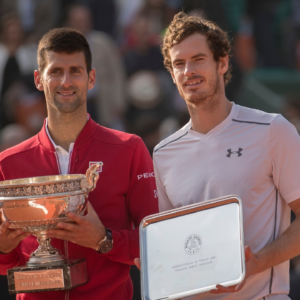 Novak Djokovic (SRB) and Andy Murray (GBR) pose with their trophies at the presentation on day 15 of the 2016 French Open