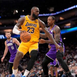 Los Angeles Lakers forward LeBron James (23) dribbles the ball next to Sacramento Kings guard DeMar DeRozan (10) in the first quarter at the Golden 1 Center.