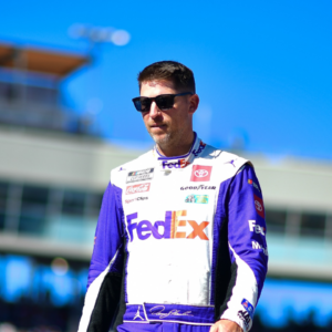 Nov 10, 2024; Avondale, Arizona, USA; NASCAR Cup Series driver Denny Hamlin (11) is introduced before the Cup Series championship race at Phoenix Raceway. Mandatory Credit: Gary A. Vasquez-Imagn Images