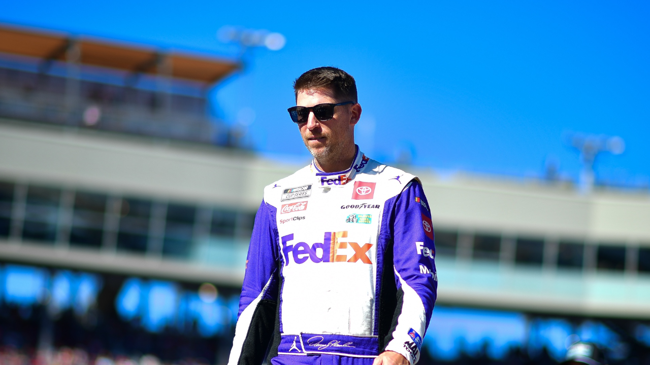 Nov 10, 2024; Avondale, Arizona, USA; NASCAR Cup Series driver Denny Hamlin (11) is introduced before the Cup Series championship race at Phoenix Raceway. Mandatory Credit: Gary A. Vasquez-Imagn Images