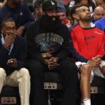 LA Clippers guard James Harden (center) on the bench during the second quarter against the Houston Rockets at Intuit Dome