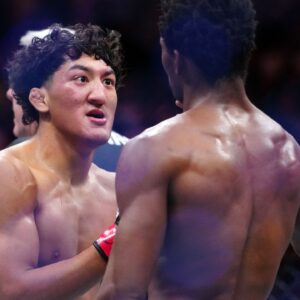 Raul Rosas Jr. (red gloves) reacts after defeating Terrence Mitchell (blue gloves) during UFC Fight Night at T-Mobile Arena.