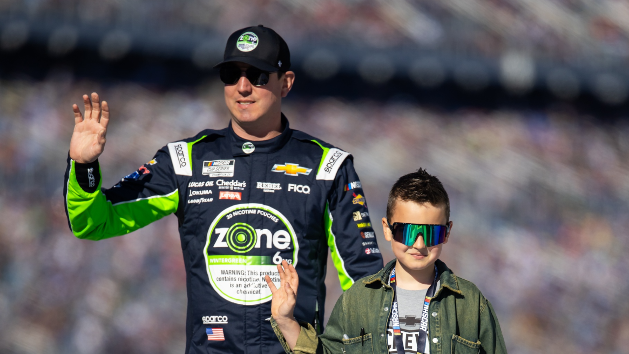 Feb 19, 2024; Daytona Beach, Florida, USA; NASCAR Cup Series driver Kyle Busch with son Brexton Busch during the Daytona 500 at Daytona International Speedway. Mandatory Credit: Mark J. Rebilas-Imagn Images