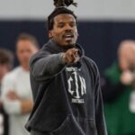 Former Auburn quarterback and NFL MVP Cam Newton runs a drill during Auburn Tigers Pro Day at Woltosz Football Performance Center in Auburn, Ala., on Tuesday, March 21, 2023.