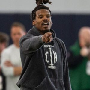 Former Auburn quarterback and NFL MVP Cam Newton runs a drill during Auburn Tigers Pro Day at Woltosz Football Performance Center in Auburn, Ala., on Tuesday, March 21, 2023.