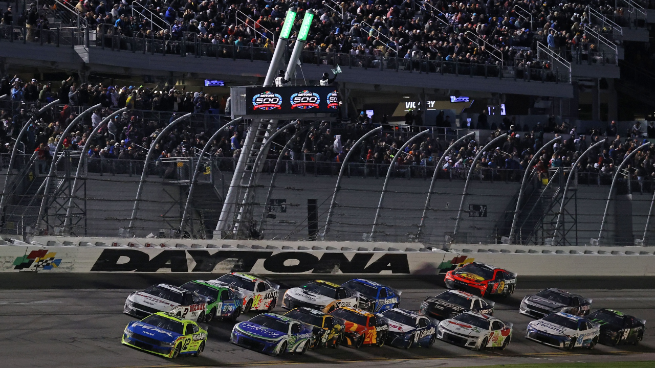 NASCAR Cup Series driver Ryan Blaney (12) leads the field during the Daytona 500 at Daytona International Speedway.