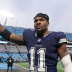 Dallas Cowboys linebacker Micah Parsons (11) walks off the field after the game at Bank of America Stadium.