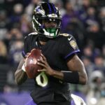 Dec 1, 2024; Baltimore, Maryland, USA;Baltimore Ravens quarterback Lamar Jackson (8) looks to pass during the first half against the Philadelphia Eagles at M&T Bank Stadium.