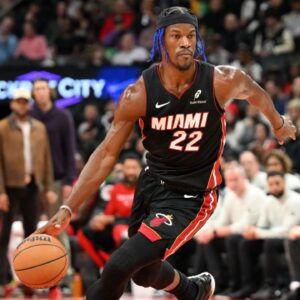 Miami Heat forward Jimmy Butler (22) dribbles the ball against the Toronto Raptors in the first half at Scotiabank Arena