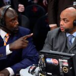 TNT broadcaster Shaquille O'Neal (left) and Charles Barkley talk during the 2013 NBA All-Star slam dunk contest at the Toyota Center.