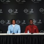 Dec 14, 2024; New York, NY, USA; From left, Heisman Trophy nominees Oregon Ducks quarterback Dillon Gabriel, Colorado Buffaloes wide receiver/cornerback Travis Hunter, Boise State Broncos running back Ashton Jeanty and Miami Hurricanes quarterback Cam Ward speak during a press conference before the 2024 Heisman Trophy Presentation.