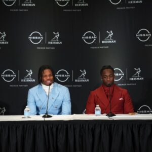 Dec 14, 2024; New York, NY, USA; From left, Heisman Trophy nominees Oregon Ducks quarterback Dillon Gabriel, Colorado Buffaloes wide receiver/cornerback Travis Hunter, Boise State Broncos running back Ashton Jeanty and Miami Hurricanes quarterback Cam Ward speak during a press conference before the 2024 Heisman Trophy Presentation.