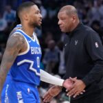 Milwaukee Bucks head coach Doc Rivers congratulates Milwaukee Bucks guard Damian Lillard (0) in the second half at Fiserv Forum.