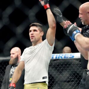 Vincent Luque (red gloves) defeats Derrick Krantz (blue gloves) during UFC Fight Night at Blue Cross Arena.