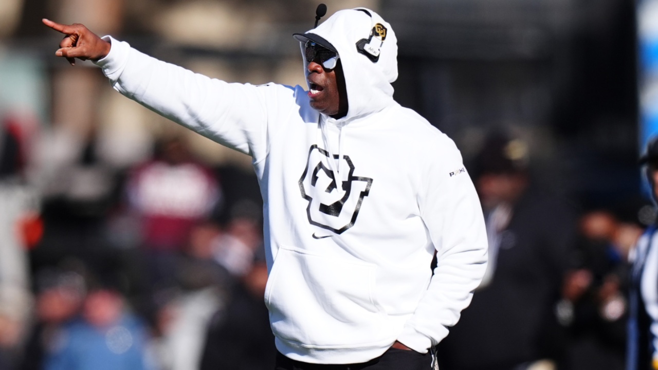 Nov 29, 2024; Boulder, Colorado, USA; Colorado Buffaloes head coach Deion Sanders calls out in the second quarter against the Oklahoma State Cowboys at Folsom Field.