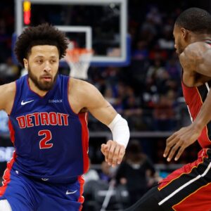 Detroit Pistons guard Cade Cunningham (2) dribbles as Miami Heat forward Haywood Highsmith (24) defends in the second half at Little Caesars Arena.