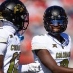 Colorado Buffalos quarterback Shedeur Sanders (2) with wide receiver Travis Hunter (12) against the Arizona Wildcats at Arizona Stadium.