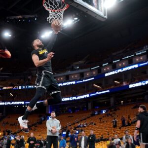 Golden State Warriors guard Stephen Curry (30) dunks the ball before the start of the game against the Sacramento Kings during game three of the 2023 NBA playoffs at the Chase Center.