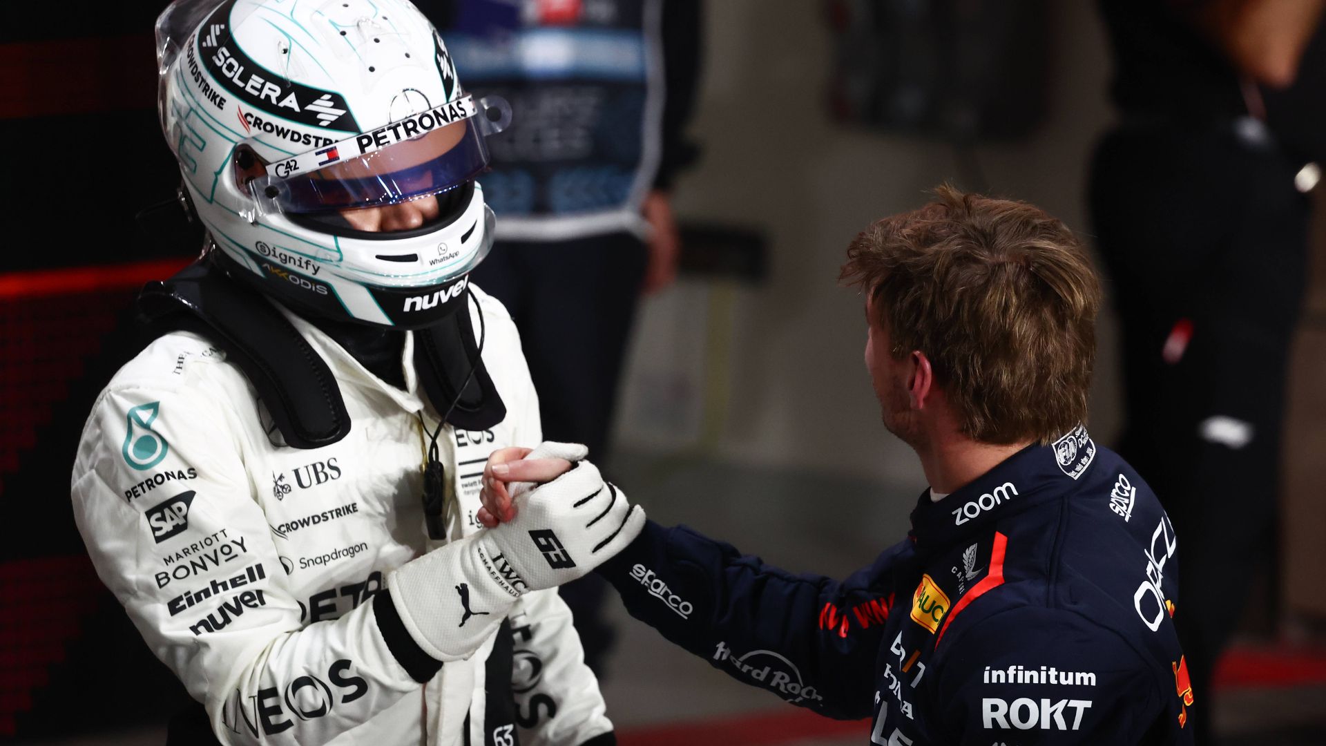 F1 Grand Prix Of Qatar 2024 Qualifying George Russell of Mercedes and Max Verstappen of Red Bull Racing after qualifying ahead of the Formula 1 Grand Prix of Qatar at Lusail International Circuit in Lusail, Qatar on November 30, 2024