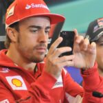 Nov. 15, 2012 - Austin, Texas, USA - Formula 1 driver FERNANDO ALONSO (left) of Spain takes pictures of the media during a press conference at the Circuit of the America s in Austin, Texas