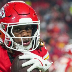 Kansas City Chiefs wide receiver Xavier Worthy (1) warms up against the Tampa Bay Buccaneers prior to a game at GEHA Field at Arrowhead Stadium.