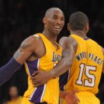 Los Angeles Lakers guard Kobe Bryant (24) and forward Metta World Peace (15) react in the fourth quarter against the Brooklyn Nets at the Staples Center. The Lakers defeated the Nets 95-90