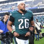 Dec 8, 2024; Philadelphia, Pennsylvania, USA; Philadelphia Eagles running back Saquon Barkley (26) runs off the field after win against the Carolina Panthers at Lincoln Financial Field.