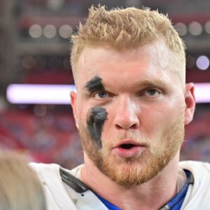 Detroit Lions defensive end Aidan Hutchinson (97) is interviewed after beating the Arizona Cardinals at State Farm Stadium.