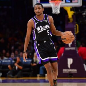 Sacramento Kings guard De’Aaron Fox (5) controls the ball against the against the Los Angeles Lakers during the first half at Crypto.com Arena.