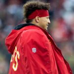 Dec 15, 2024; Cleveland, Ohio, USA; Kansas City Chiefs quarterback Patrick Mahomes (15) walks to the sideline during a timeout in the fourth quarter against the Cleveland Browns at Huntington Bank Field.