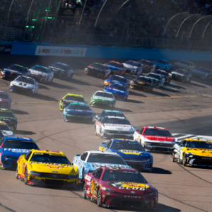 NASCAR Cup Series driver Martin Truex Jr leads Joey Logano (22) at the green flag to start the NASCAR Cup Series Championship race at Phoenix Raceway.