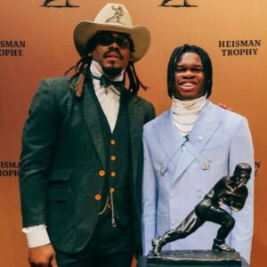 Travis Hunter with Cam Newton