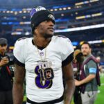 Baltimore Ravens quarterback Lamar Jackson (8) reacts following the victory against the Los Angeles Chargers at SoFi Stadium.