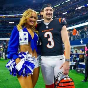 Cincinnati Bengals kicker Cade York (3) takes a photo with his Dallas Cowboys cheerleader girlfriend Zoe Dale after the game against the Dallas Cowboys at AT&T Stadium.